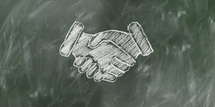 handschlag-team-tafel-kreide
